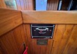 Propane control panel on a wood wall with OFF/ON switches and 'Turn off when not in use' instruction.