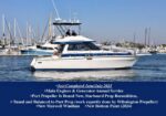 White motor yacht in a marina with a dark blue banner at the bottom listing completed services (June–July 2025): engine and generator service, prop work, windlass, and bottom paint.