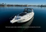 White motor yacht on calm water; caption reads: 'The forward sunpad provides a comfortable, open space to relax and enjoy time on the water.'