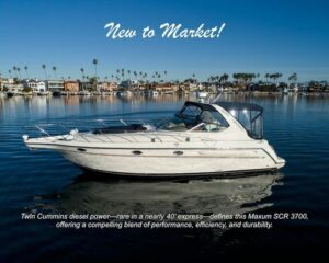 Motorboat on calm marina water with 'New to Market!' headline; promotional image for a Maxum SCR 3700 boat with a brief spec caption visible.