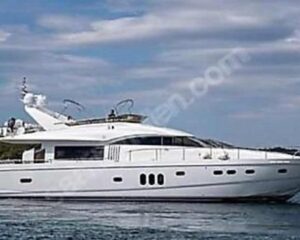 2008-princess-75-motor-yacht-power-9903849-20250808074352001-1 | Boat Universe White luxury motor yacht cruising on calm blue water under a partly cloudy sky