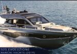 Cranchi Yachts E52S Evoluzione luxury motor yacht speeds over blue water; Italian flag at stern with a 2019 label overlay.