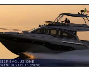 2020-cranchi-e-52f-evoluzione-power-9957579-20250924090710986-1 | Boat Universe Cranchi E52F Evoluzione motor yacht at sunset with two people on the upper deck and the Italian flag