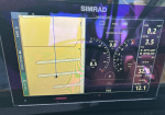 SIMRAD marine display showing left-side sonar/bottom view with grid lines, and right-side digital gauges for speed, depth, and fuel.