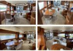 Luxurious yacht interior with round wooden dining tables, cream chairs, and curved white seating by windows.