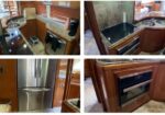 Collage of a yacht galley with wooden cabinets, granite countertops, and stainless steel appliances including a double sink and oven.