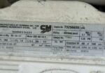 Close-up of a Cummins diesel engine nameplate showing model QSB 480 HO P, engine number 73256655, assembled in the USA, EPA flag, and various technical specs.